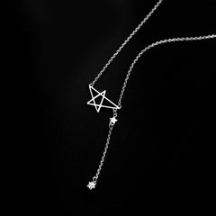 Close-up of the pendant and clasp on the Star Tassel Necklace