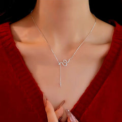 Sterling Silver Snake Dancing Necklace worn to showcase its length and pendant detail