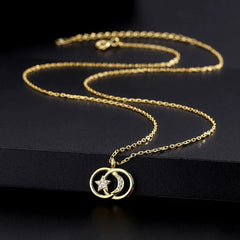 Close-up of the pendant and clasp on the Star and Moon Necklace