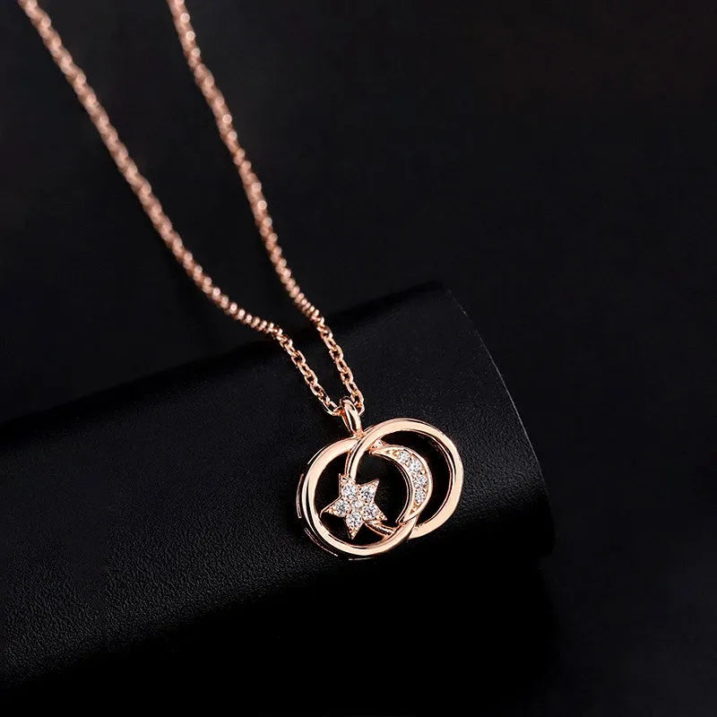 Detailed view of the Sterling Silver Star And Moon Necklaces chain and pendant