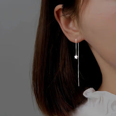 Model showcasing the dangle and style of the Sterling Silver Star Threader Earrings