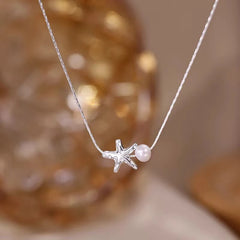 Detailed view of the Sterling Silver Starfish Natural Pearl Necklace chain and pendant
