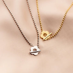 Close-up of the pendant and clasp on the Summer Flower Necklace