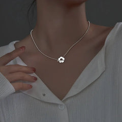 Sterling Silver Summer Flower Necklaces worn to showcase its length and pendant detail