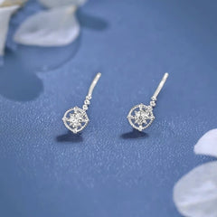 Model showcasing the dangle and style of the Sterling Silver Sun Threader Earrings