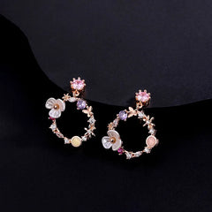 Angled view of the Sterling Silver Super Fairy Flower Earrings