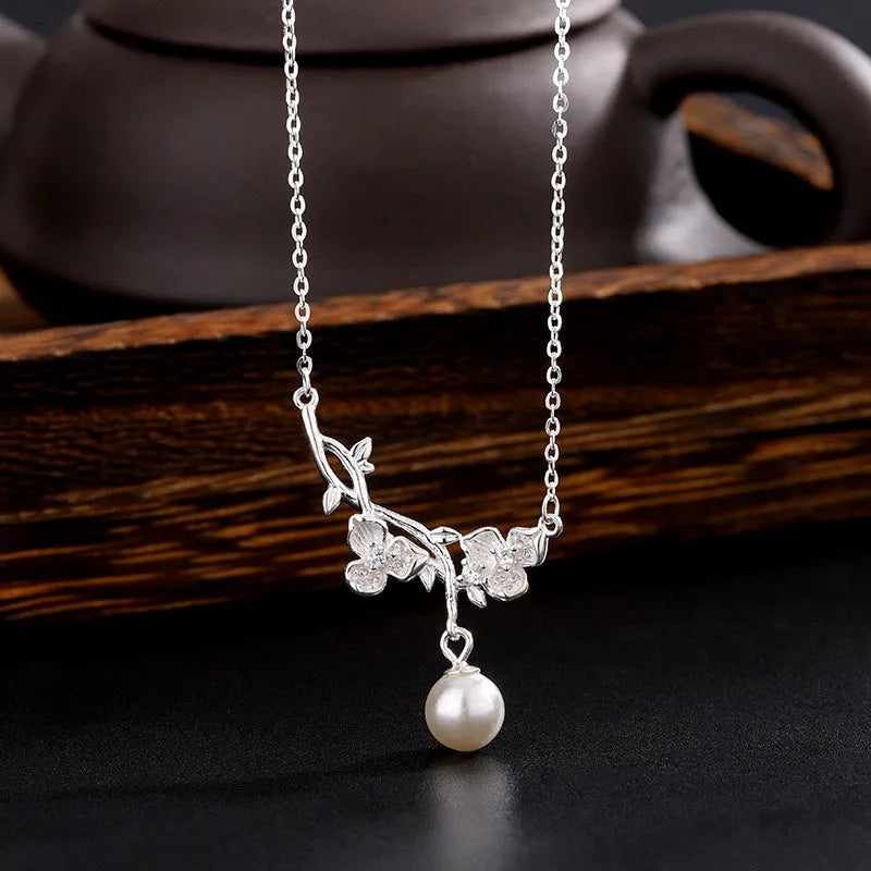 Close-up of the pendant and clasp on the Thorn Branch Necklace