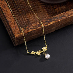 Detailed view of the Sterling Silver Thorn Flower Branch Necklaces chain and pendant