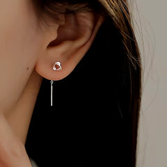 Model showcasing the dangle and style of the Sterling Silver Threader Earrings
