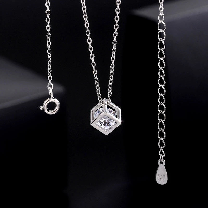 The perfect Hollow Cube Necklace for layering or wearing as a statement piece
