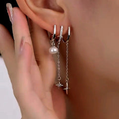 Model showcasing the dangle and style of the Sterling Silver Three-Layer Pearl Star Tassel Earrings