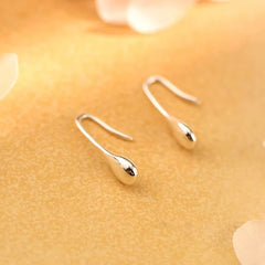Close-up detail of the sparkling zircons and plating on the Water Drop Ear Hooks