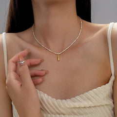 Sterling Silver Water Drop Earrings worn to showcase its length and pendant detail