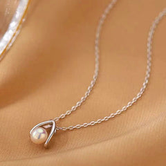 Sterling Silver Water Drop Split Pearl Necklaces worn to showcase its length and pendant detail