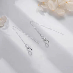 Close-up detail of the sparkling zircons and plating on the Infinity Threader Earrings