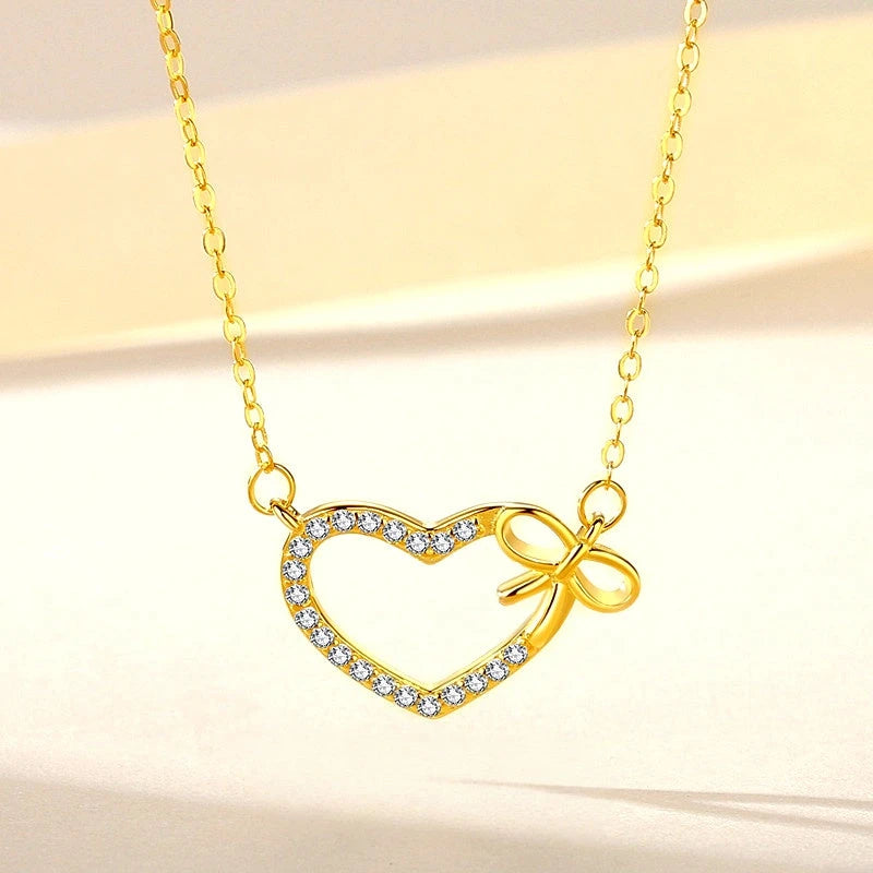 Close-up of the pendant and clasp on the Wish Heart Necklace