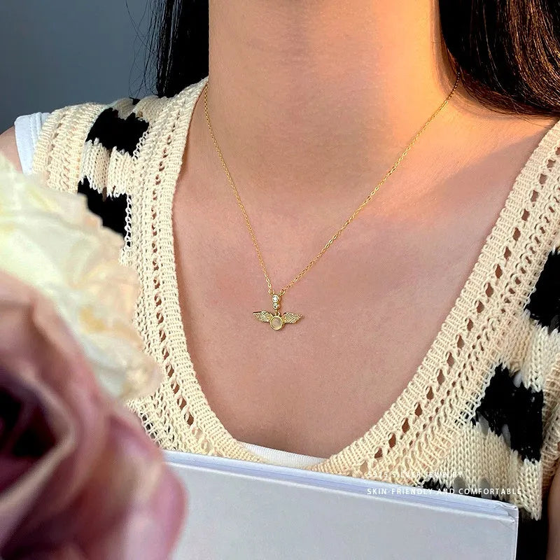 Sterling Silver Zircon Angel Wing Necklace worn to showcase its length and pendant detail