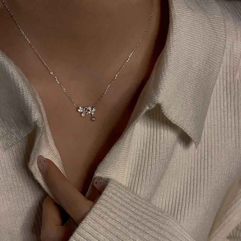 Close-up of the pendant and clasp on the Fairy Butterfly Necklace