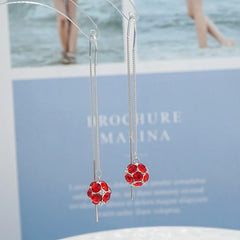 Model showcasing the dangle and style of the Sterling Silver Zircon Ball Threader Earrings