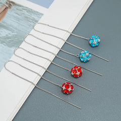 Angled view of the Sterling Silver Zircon Ball Threader Earrings