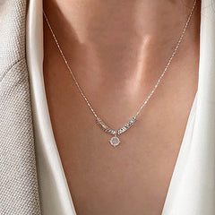 Sterling Silver Zircon Broken Silver Necklace worn to showcase its length and pendant detail