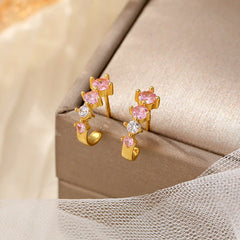Angled view of the Sterling Silver Zircon C-Shaped Earrings