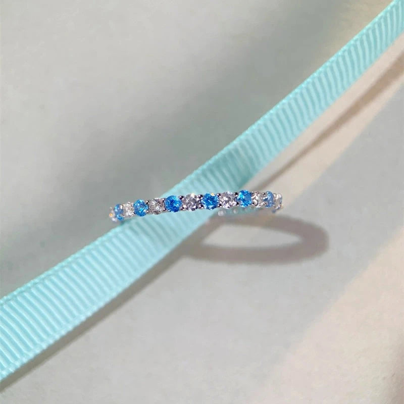 Model's hand wearing the elegant Sterling Silver Zircon Diamond Gemstone Rings