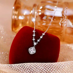 Close-up of the pendant and clasp on the Sugar Cube Necklace