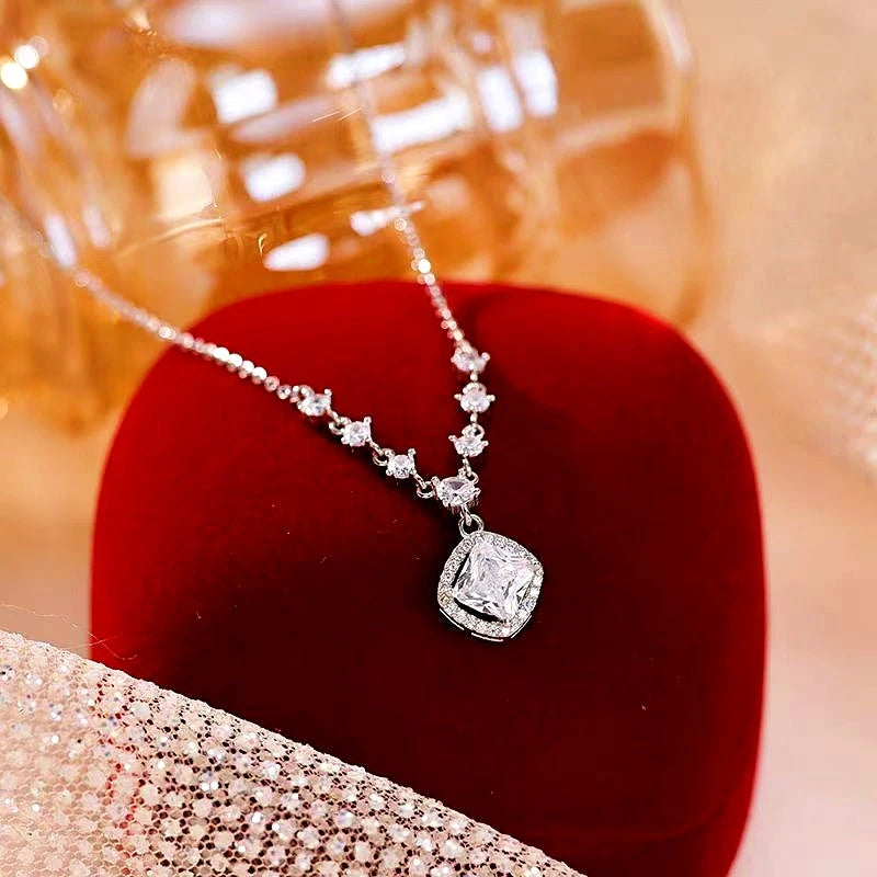 Detailed view of the Sterling Silver Zircon Diamond Sugar Cube Necklace chain and pendant