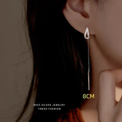 Angled view of the Sterling Silver Zircon Diamond Water Drop Threader Earrings