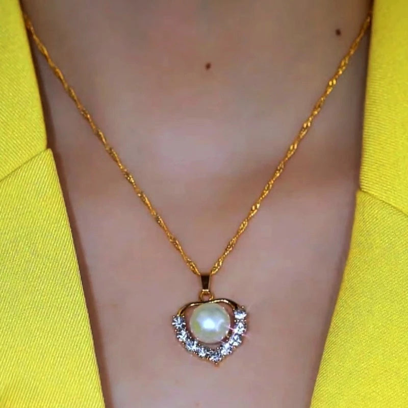 Detailed view of the Sterling Silver Zircon Heart-Design Pearl Chain Necklace chain and pendant