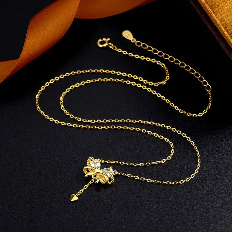 Detailed view of the Sterling Silver Zircon Heart Bow Necklace chain and pendant