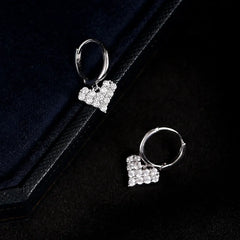 Angled view of the Sterling Silver Zircon Heart Earrings