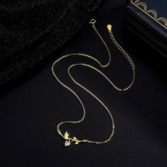 Detailed view of the Sterling Silver Zircon Heart Leaf Earrings chain and pendant