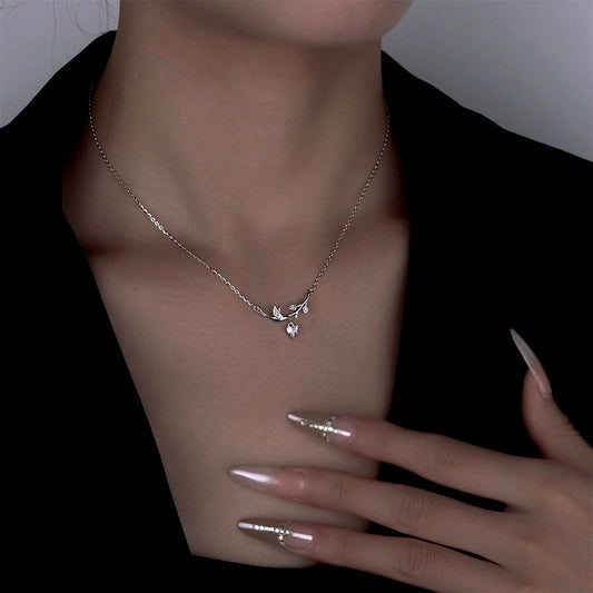 Sterling Silver Zircon Heart Leaf Earrings - beautiful Heart Leaf Necklace (*Correction: Handle says earrings, tags say necklace. Price point fits a necklace better.*)