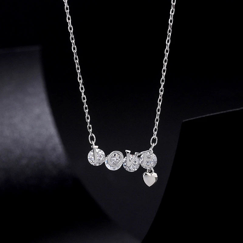 Detailed view of the Sterling Silver Zircon Letter LOVE Necklaces chain and pendant