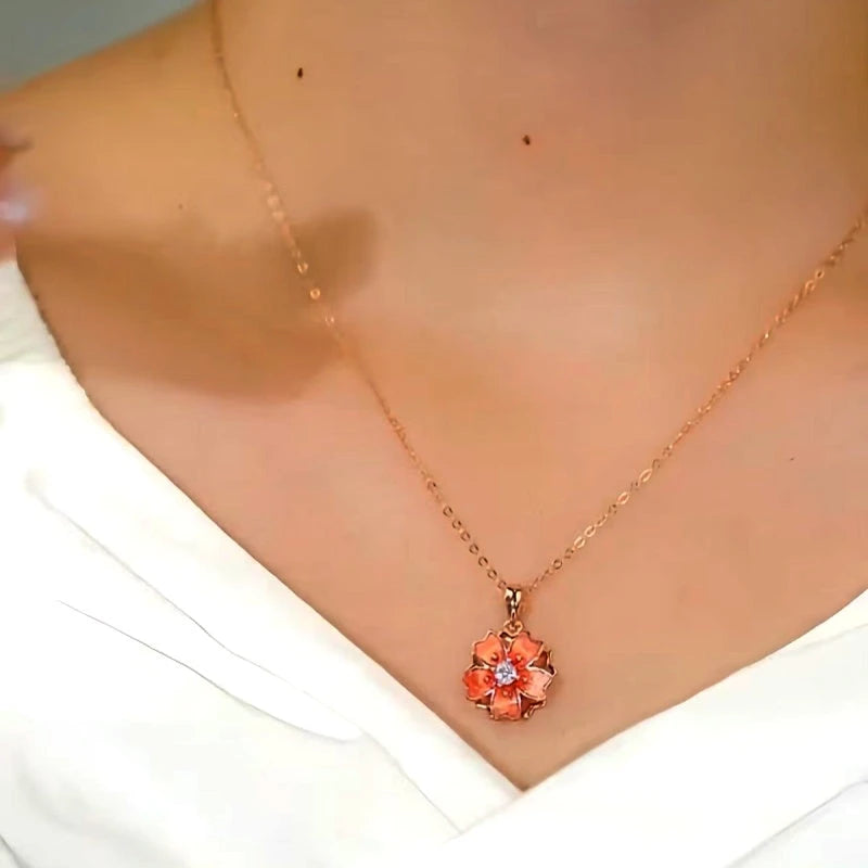 Detailed view of the Sterling Silver Zircon Rotating Peach Blossom Clavicle Necklace chain and pendant