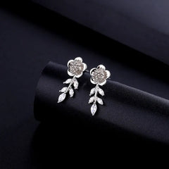 Close-up detail of the sparkling zircons and plating on the Zircon Flower Earrings