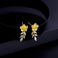 Angled view of the Sterling Silver Zircon Small Fragrance Style Flower Earrings
