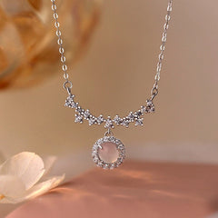 Close-up of the pendant and clasp on the Smile Face Necklace