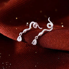Close-up detail of the sparkling zircons and plating on the Zircon Snake Earrings