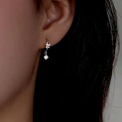 Close-up detail of the sparkling zircons and plating on the Zircon Butterfly Earrings
