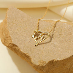 Sterling Silver Heart Rose Letter Necklaces worn to showcase its length and pendant detail