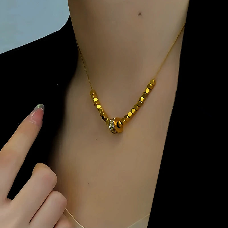 Close-up of the pendant and clasp on the Sugar Cube Necklace