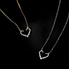 Sterling Silver Luxury Diamond Hollow Heart Necklace worn to showcase its length and pendant detail