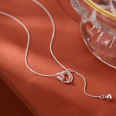 Close-up of the pendant and clasp on the Ring Holder Necklace