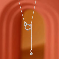 Detailed view of the Sterling Silver Ring Necklace chain and pendant