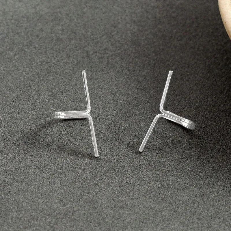 Angled view of the Sterling Silver Cross-Border Ear Clips ( 1 Pair )