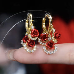Sparkly Gold Red Rose Rhinestone Dangle Hoop Earrings on Finger
