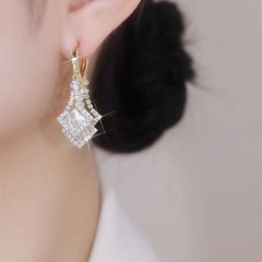 Gold Layered Square Cubic Zirconia Drop Earrings Worn on Ear